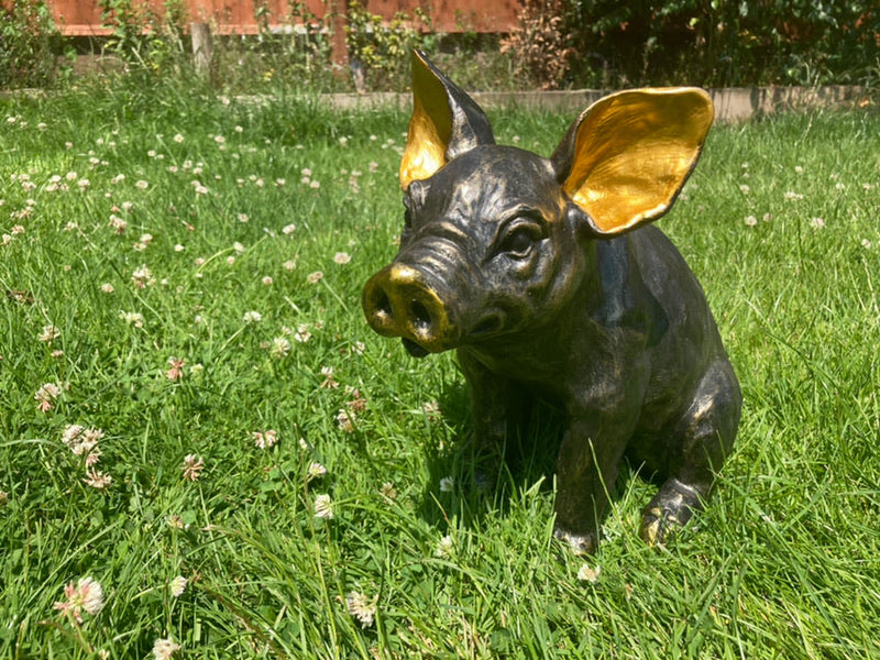 How to Clean & Care for Pig Garden Statues