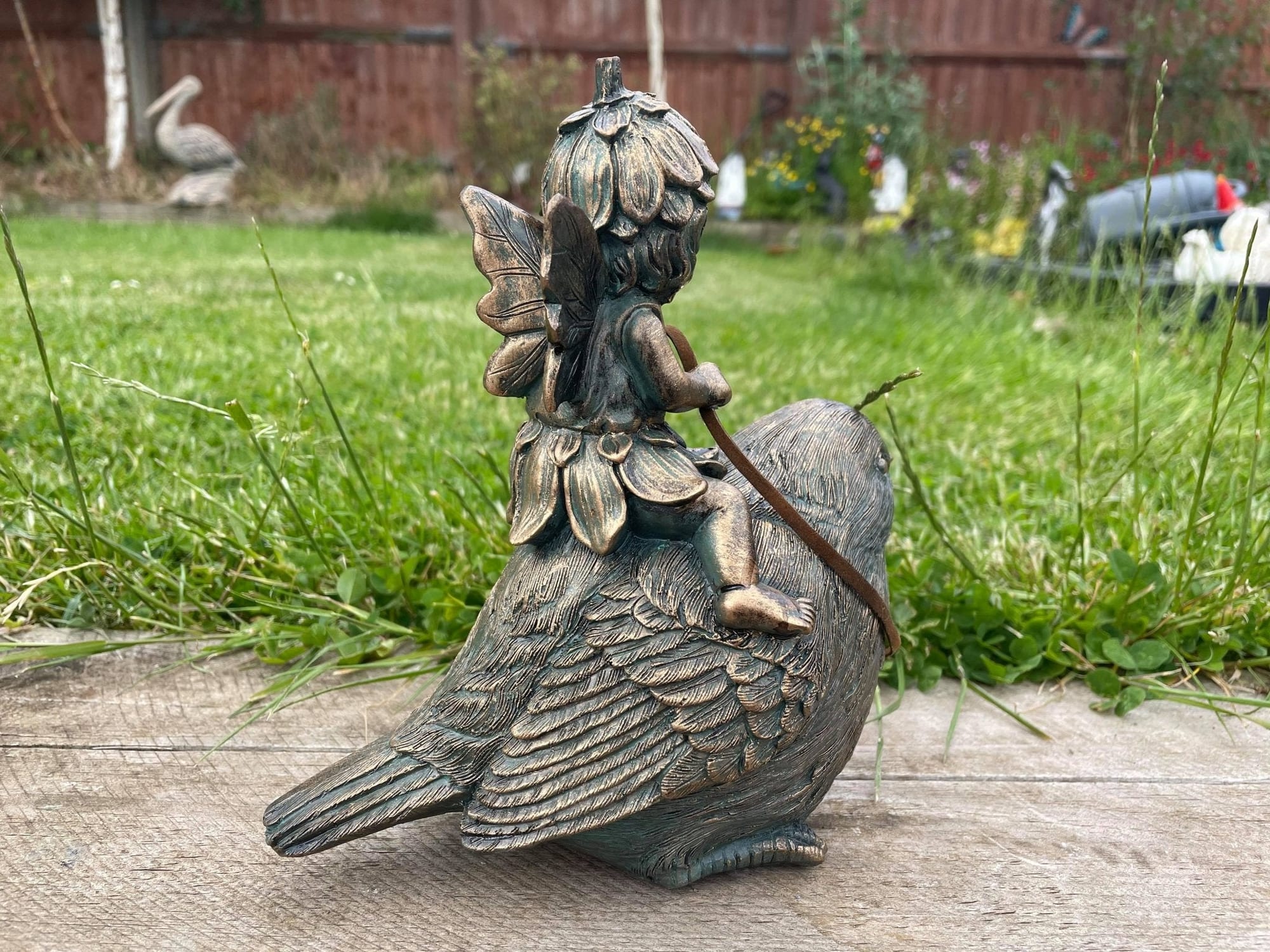 Fairy on Bird - Backyard Bliss