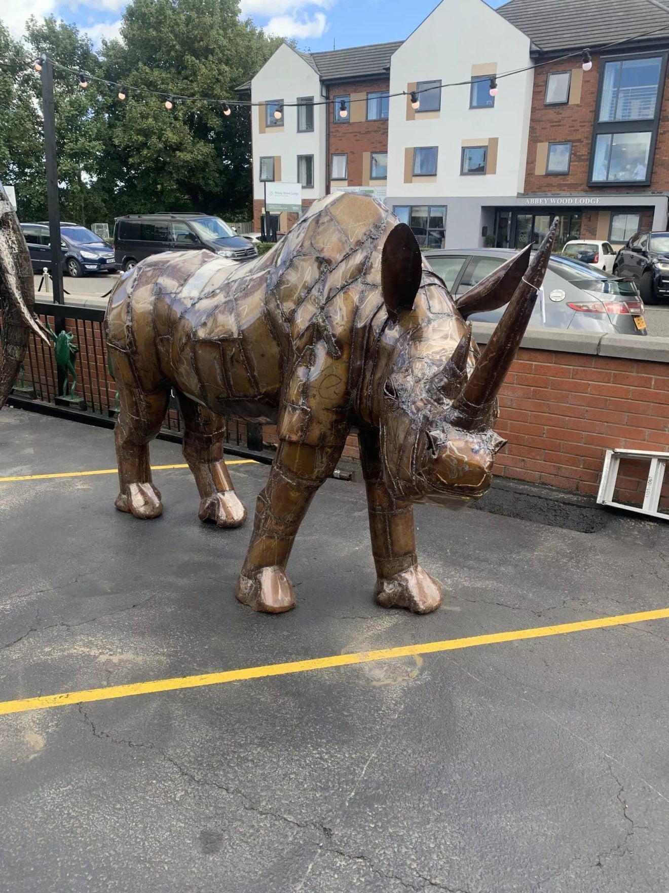 Life Size Metal Rhino Sculpture - Backyard Bliss
