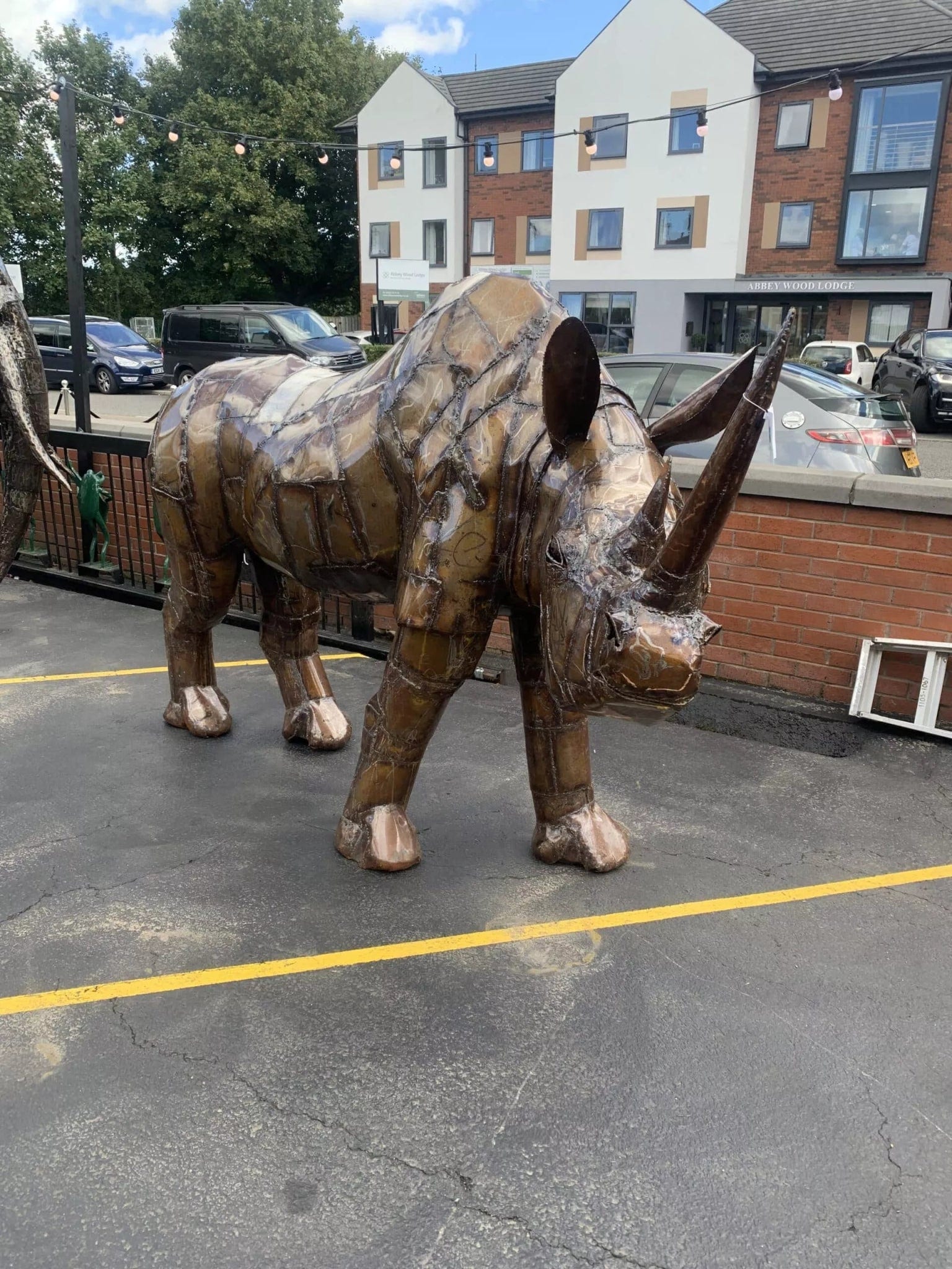 Life Size Metal Rhino Sculpture - Backyard Bliss